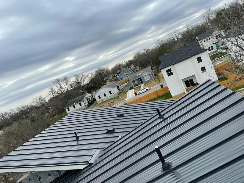 Standing seam metal roof panels with vents for Skylight Repair in Ferndale